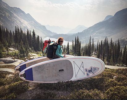 icl Demurs Lake with Celeste carrying paddleboard